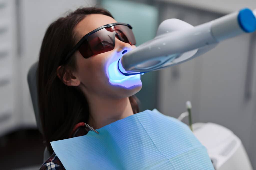 Laser teeth whitening procedure in a clean dental clinic
